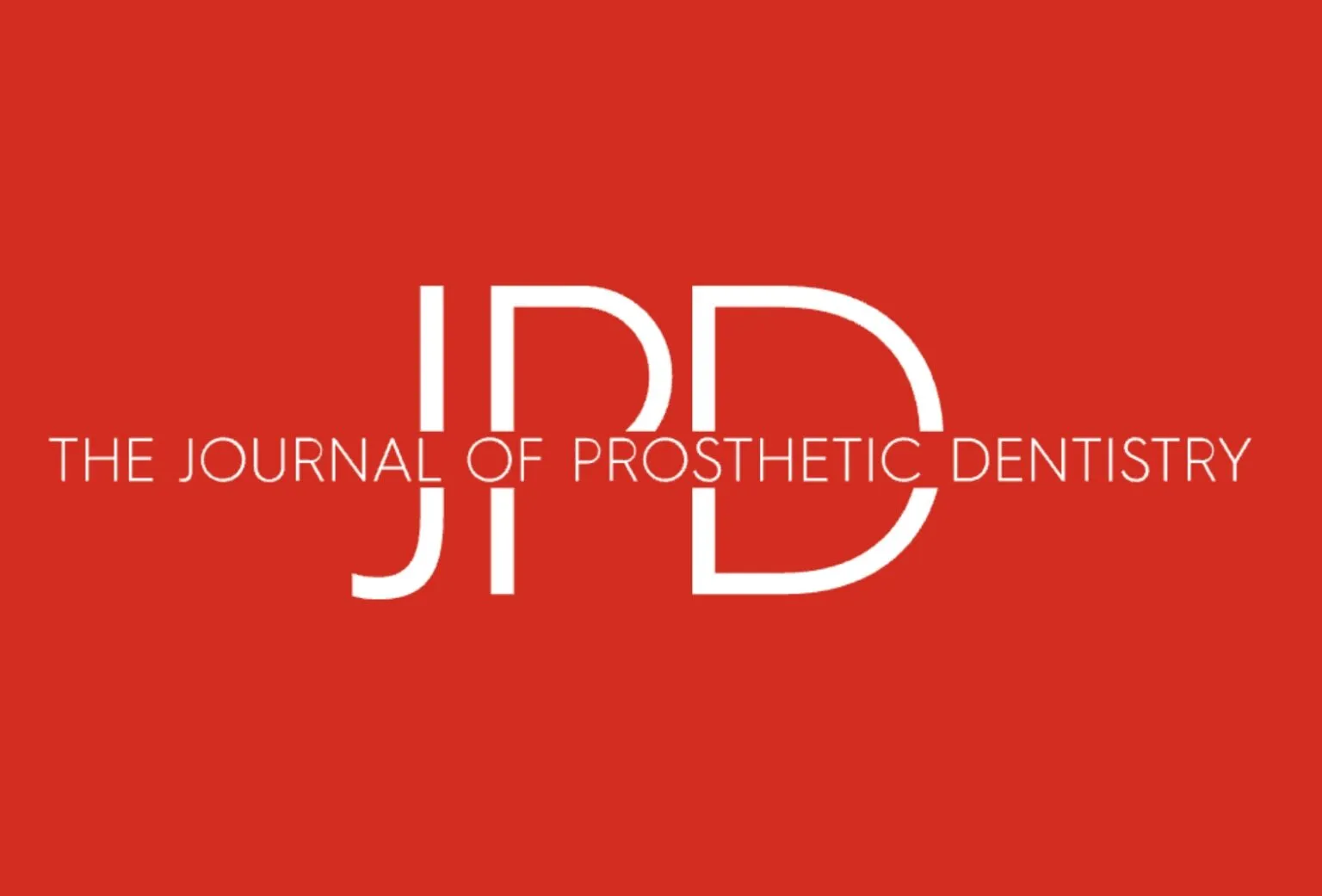 Journal of Prosthetic Dentistry (JPD) logo on a red background